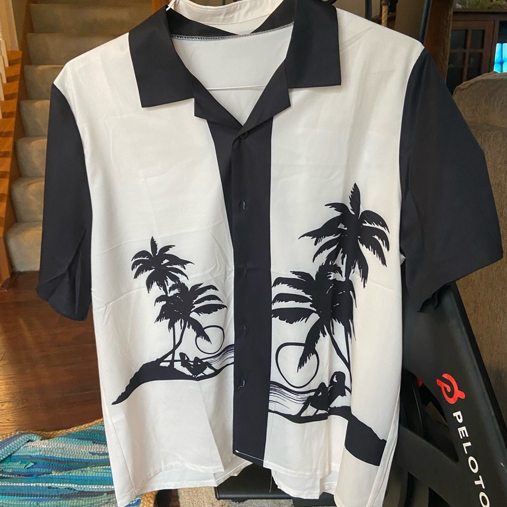 Three men’s camp shirts. All are the same size.
